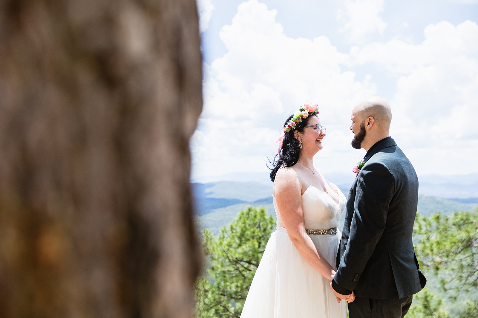 Bride & Groom share an intimate moment at their Mogollon Rim elopement by Arizona elopement photographer PMA Photography.