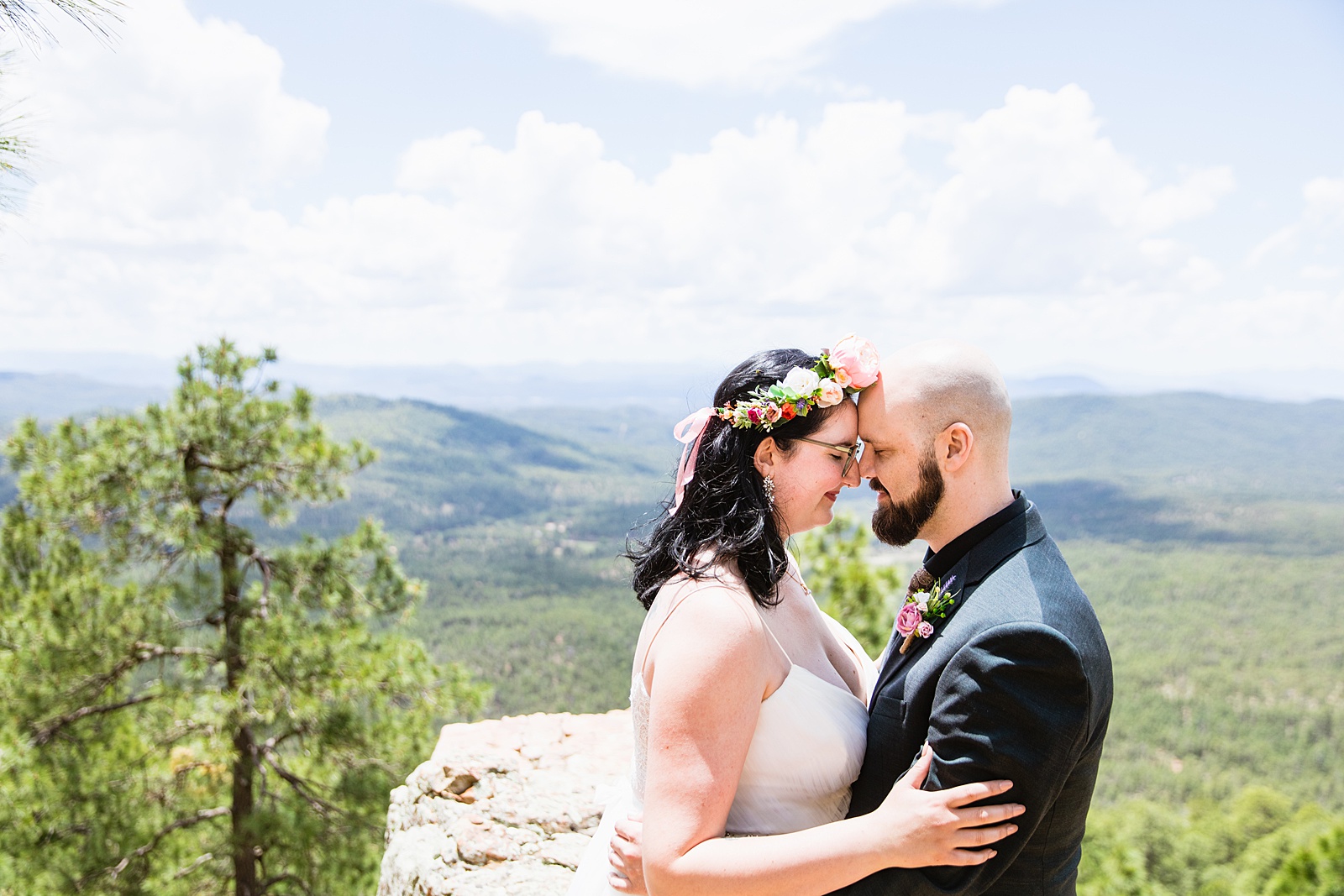 Bride & Groom share an intimate moment during their Mogollon Rim elopement by Payson elopement photographer PMA Photography.