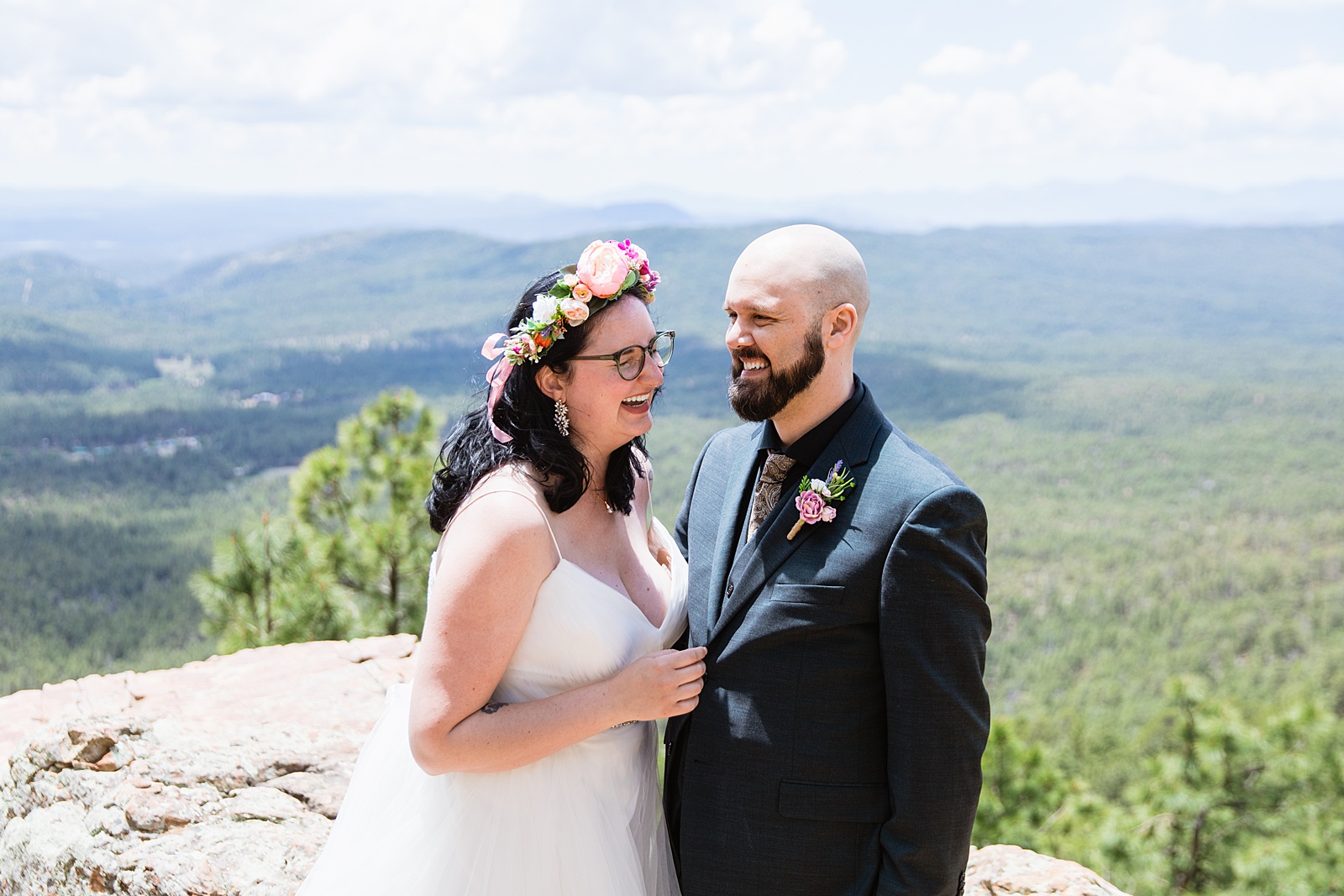Bride & Groom laughing together during their Mogollon Rim elopement by Payson elopement photographer PMA Photography.