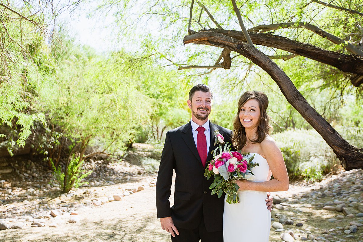 Classic fuchsia/bold pink bride and groom at Hermosa Inn in Phoenix Arizona by wedding photographers PMA Photography.