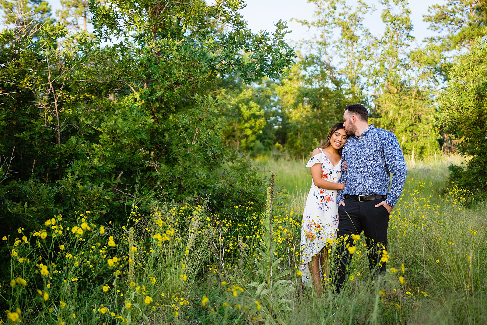 Couple share an intimate moment during their Mogollon Rim engagement session by Payson engagement photographer PMA Photography.