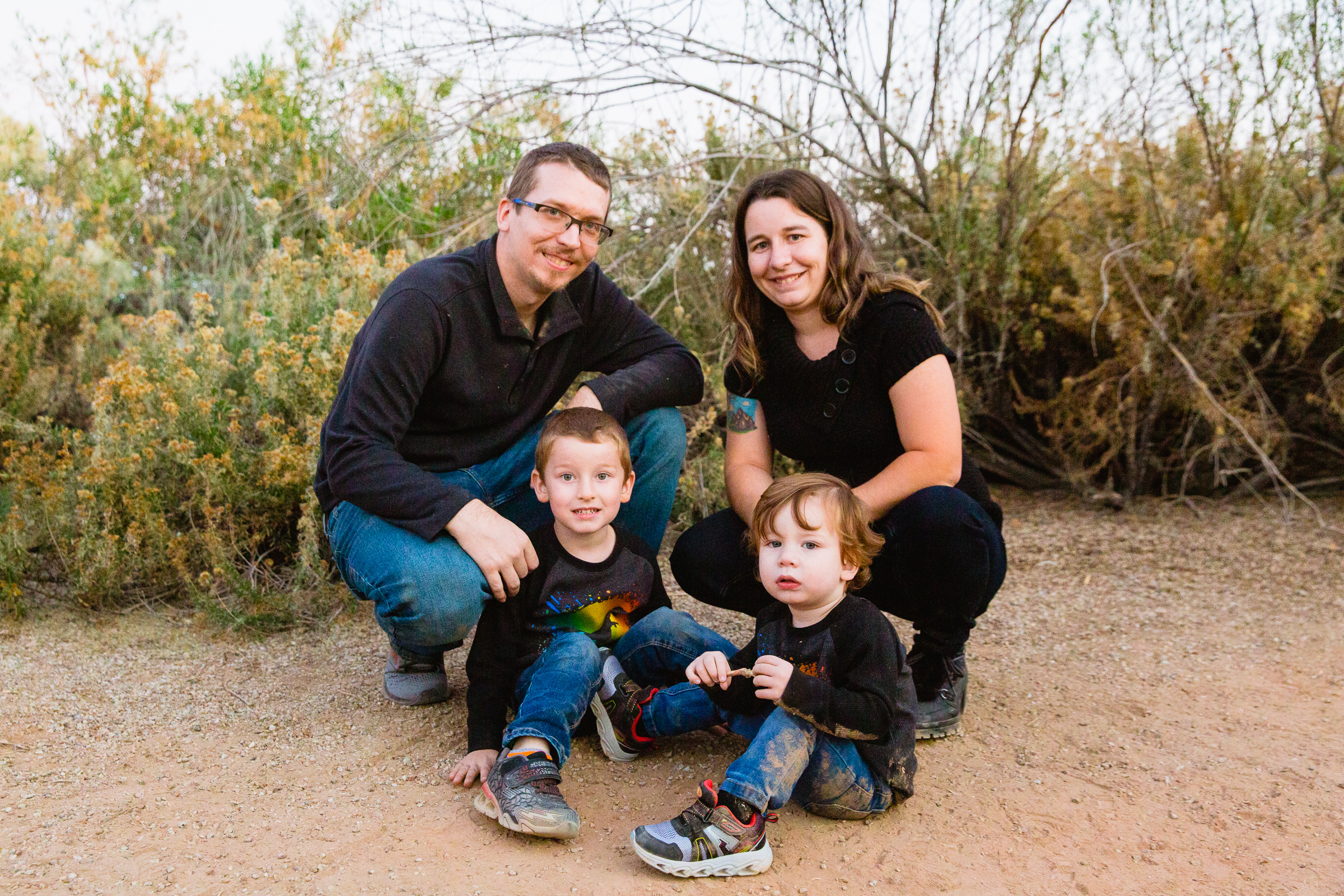 Family pose for their Riparian Preserve at Water Ranch family session by Gilbert family photographer PMA Photography.