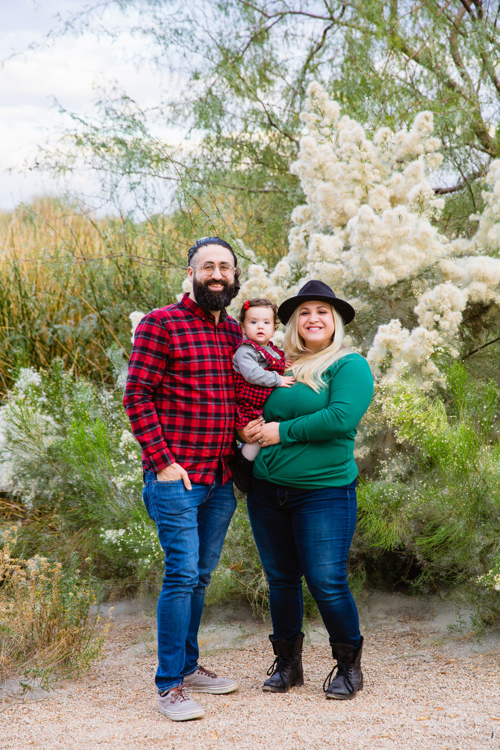 Family pose for their Riparian Preserve at Water Ranch family session by Gilbert family photographer PMA Photography.
