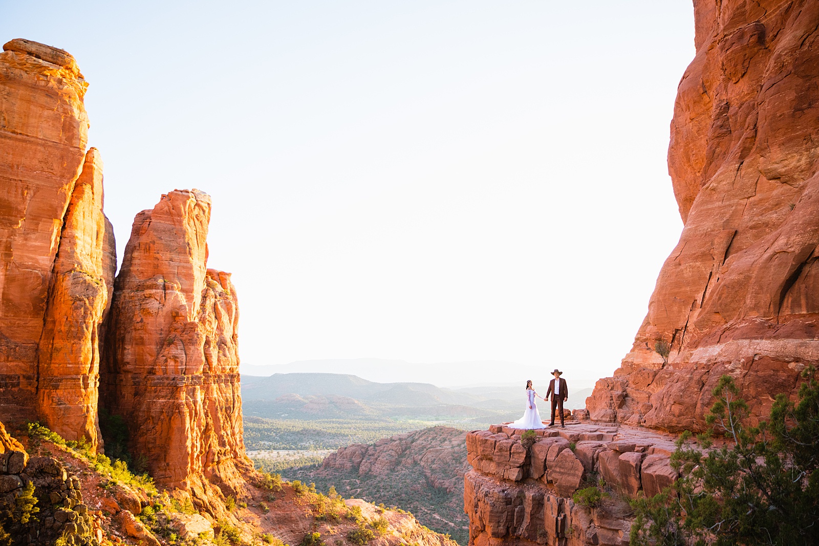Bride and Groom pose for their Cathedral Rock elopement by Sedona elopement photographer PMA Photography.